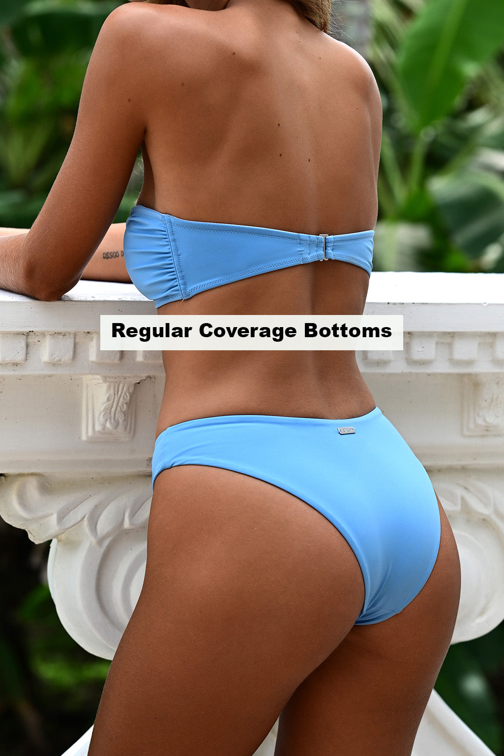 Back view of a woman wearing the Aruba Bikini Baby Blue Set.
