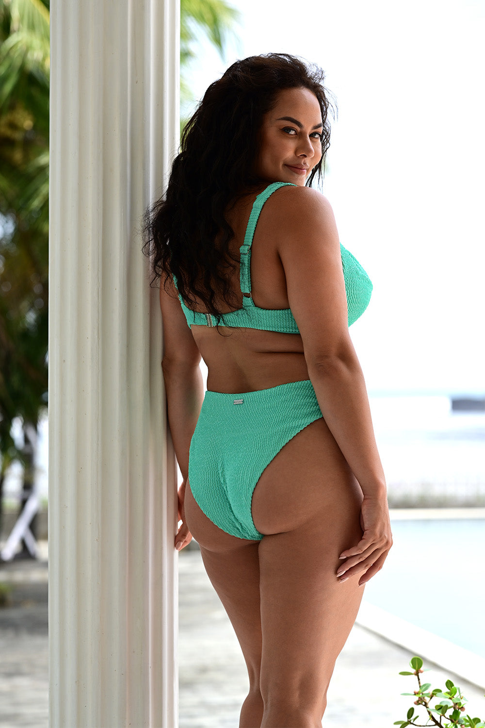 Back view of a woman wearing the Laguna Bikini Crinkle Mint Set.