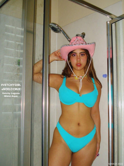 Front view of a woman wearing the Laguna Bikini Aqua Set.