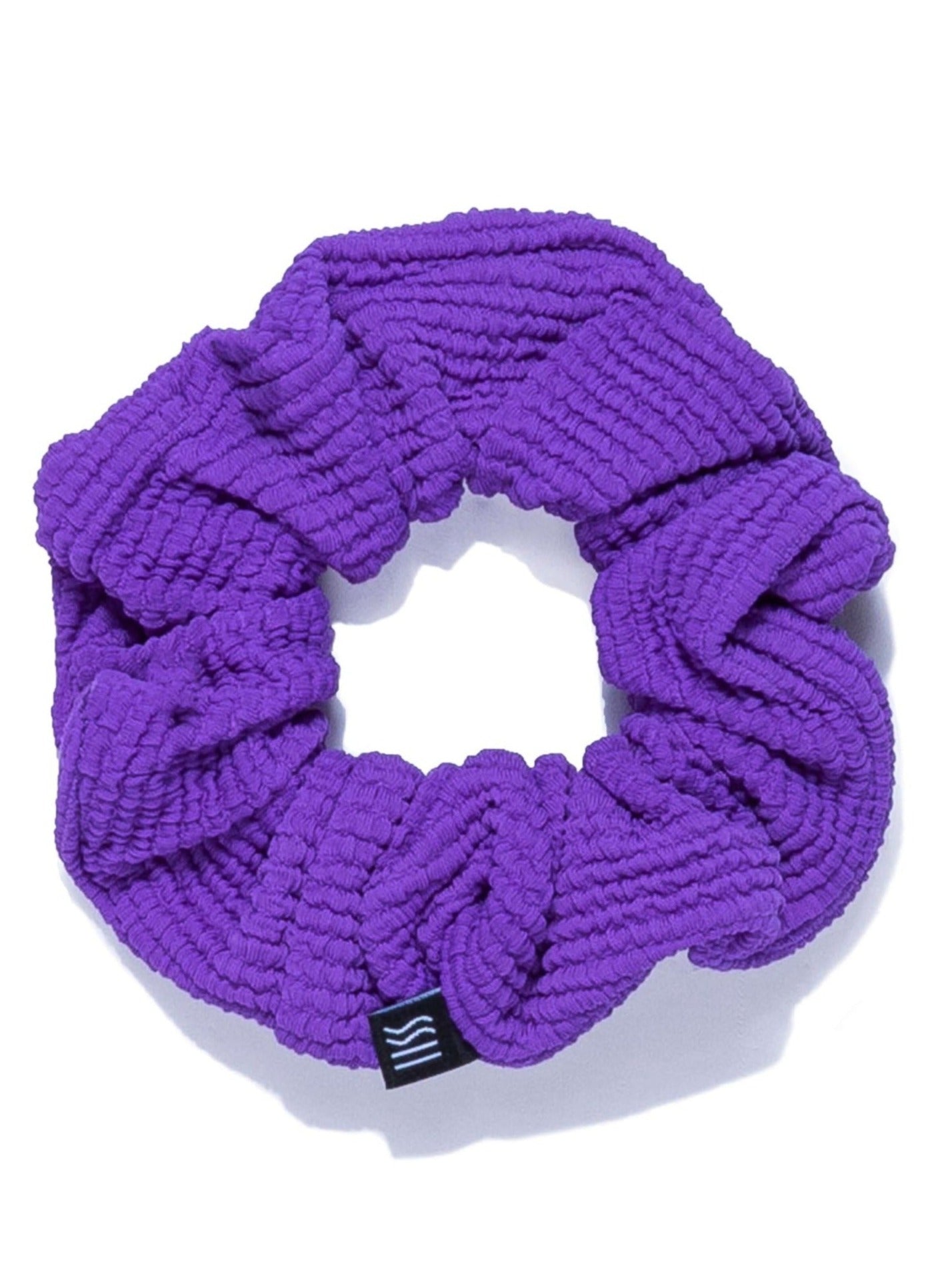 Purple Scrunchie on white background.