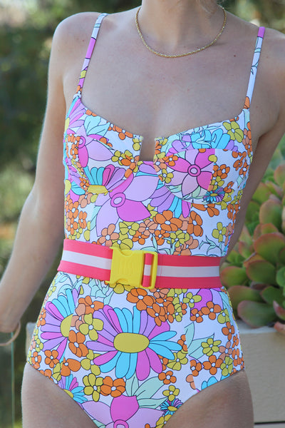 Close-up front view of a woman wearing the Montego Underwire Floral Swimsuit.