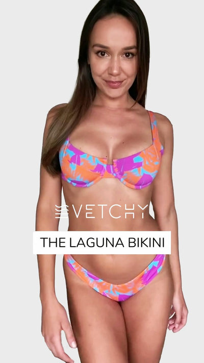 Front view of a petite woman wearing the Laguna Bikini Tropical Set. The text on the image reads "Vetchy, The Laguna Bikini" 
